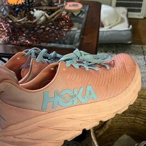 Hoka peach sneakers